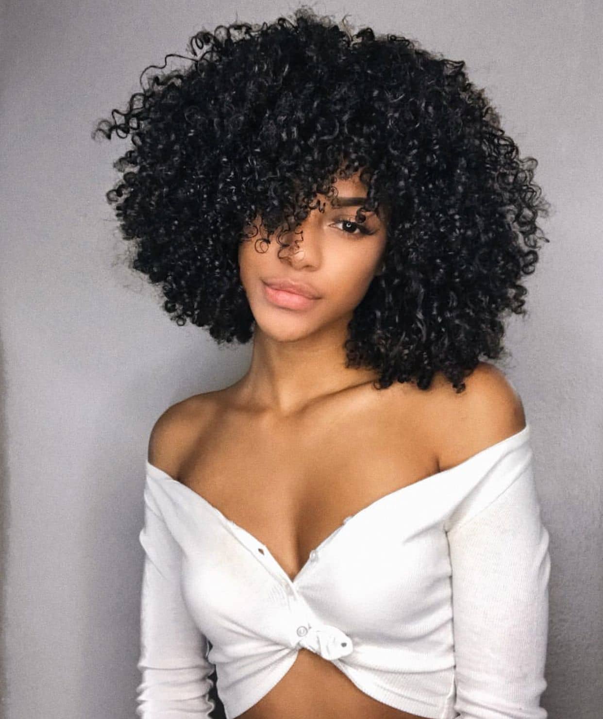 https://thecuddl.com/haircuts-for-curly-hair-ideas-designs/