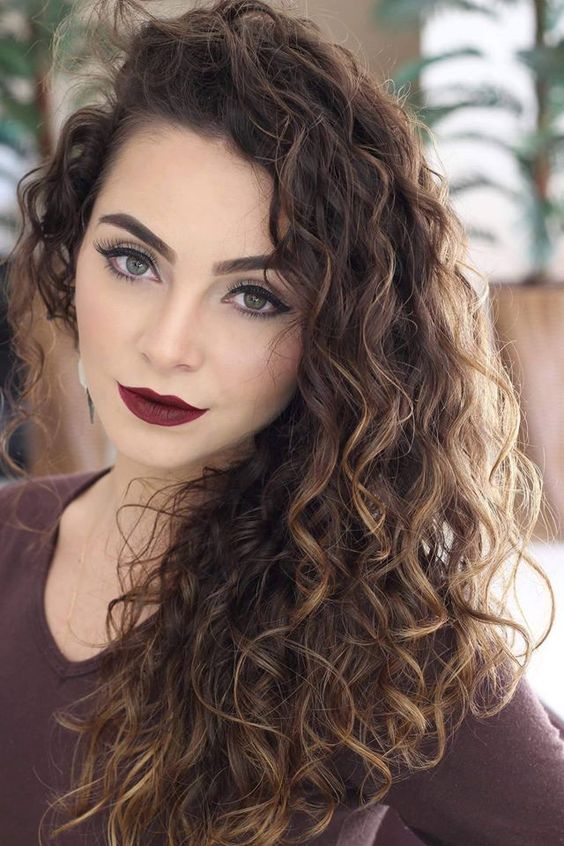 How To Grow Long Curls Without Ruining Your Budget