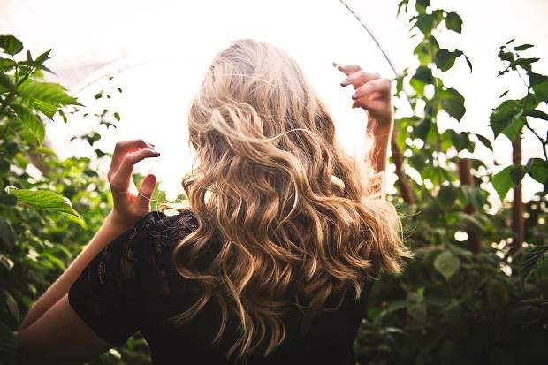 How To Wash Your Curls Less